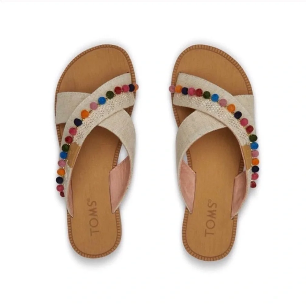 NWT! Tom’s kids’ bohemian Pom Pom sandals. Size 2